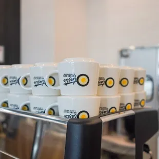 a row of coffee cups