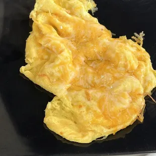 Side of cheesy eggs