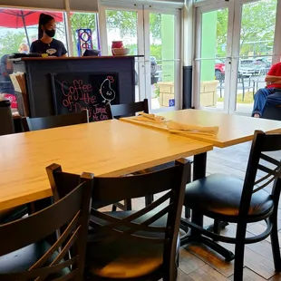 May 31, 2021: Benches outside for those waiting for a table-- busy place