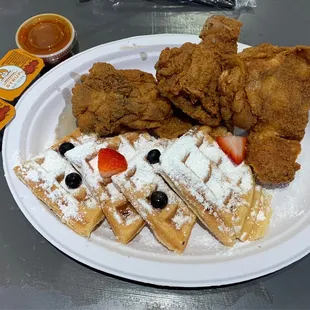 Chicken and waffles with fruit toppings