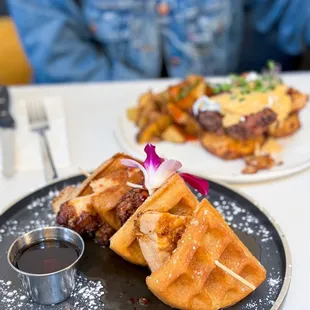 Chicken and waffles and chicken benedict in the back