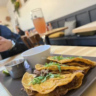 Birria tacos. Salsa was