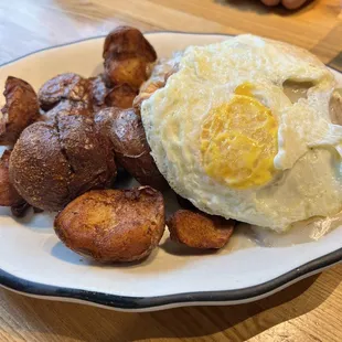 fried eggs and potatoes