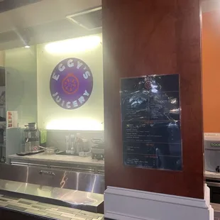 Inside at the ordering counter. Don't get a close up of the menu. Next time.