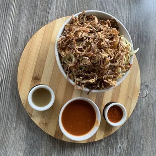 Koshari Bowl - super delicious national dish! There is pasta noodles, rice, macaroni, fried onions with some refreshing sauces.