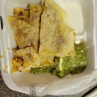 chicken quesidilla with sour cream and guac. really good!