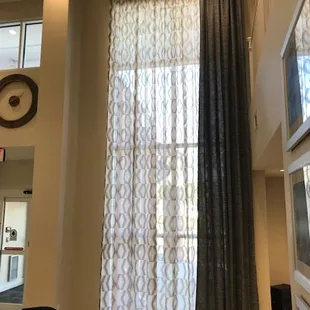 Entry with draperies and sheers