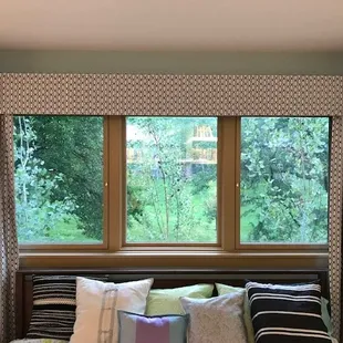 Beautiful cornice and silk side panels.