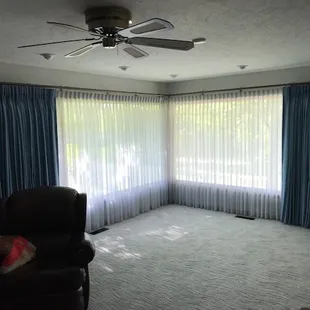 Draperies and sheers on a corner window