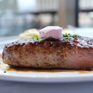 *Prime Aged New York Steak, Cabernet Butter, Potato Gratin, French Green Beans  Additional $24