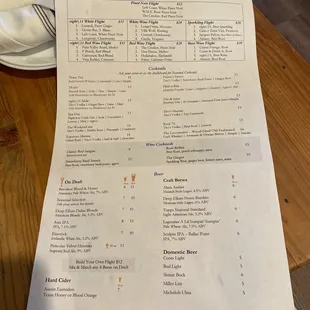 Current wine flight and cocktail menu