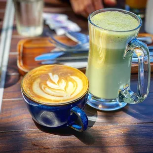 two cups of coffee on a table