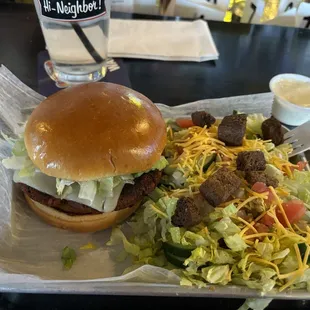 Veggie burger with side salad