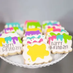 a plate of decorated cookies