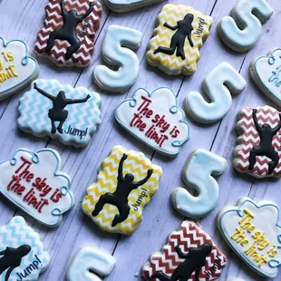 a number of decorated cookies