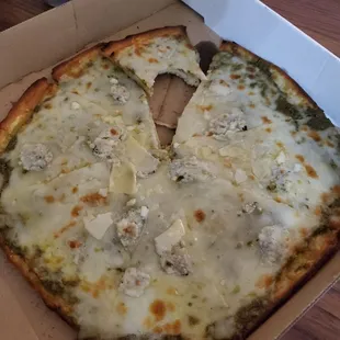 a cheese pizza in a box