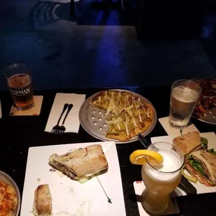 a table full of food and drinks