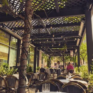 The al fresco space. Super cute, but definitely sit closer to the building and not the street to escape the fumes from idling traffic!!