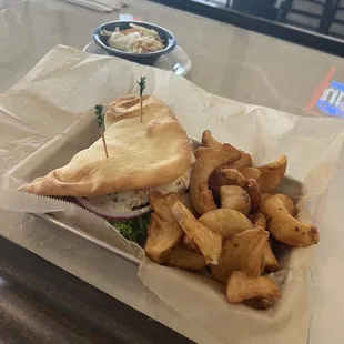 Flatbread Sandwich with chicken and fries