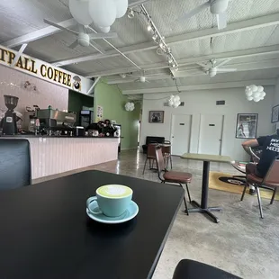 a cup of coffee on a table