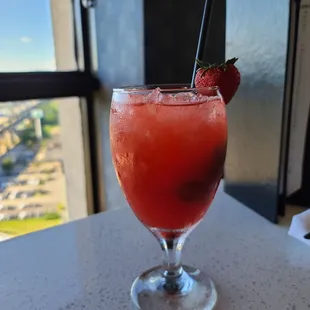 a glass of strawberry juice