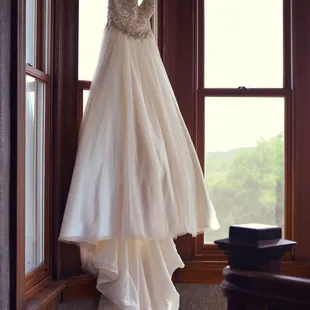 Wedding dress hanging in the 1890 house