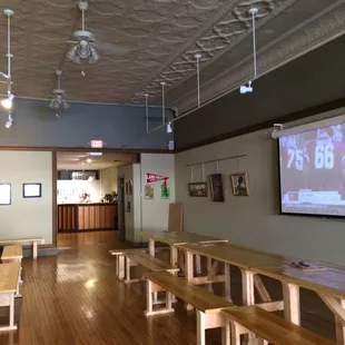 ows a long table and benches