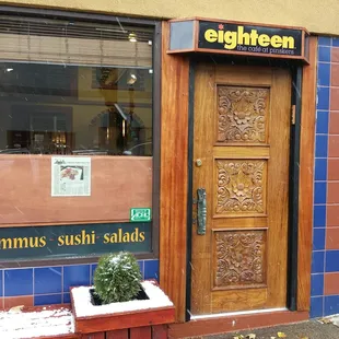 the front door of a restaurant