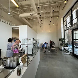 a woman holding a baby