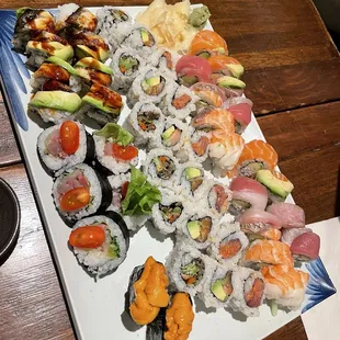 Top to bottom: Rainbow roll, Alaska Roll, Salmon Skin Roll Bottom from left to right: Dragon Roll, Ceviche Roll, Uni