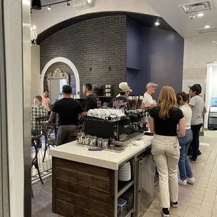 a group of people in a coffee shop