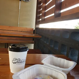 Outdoor seating area, 12oz latte with macadamia milk and blueberry GF muffin ~$9 incl tip