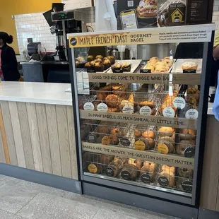 Puppy bagels in jar on top of bagel case with price on jar!