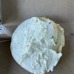 "Toasted well" green chili and cheese bagel.