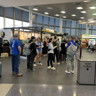 a group of people waiting in line