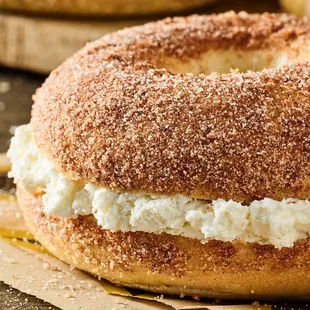 a close up of a bagel sandwich