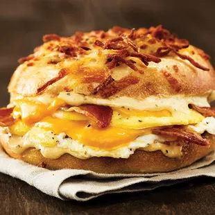 bacon, eggs, and cheese on a bagel