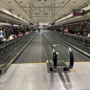 an escalator in the airport
