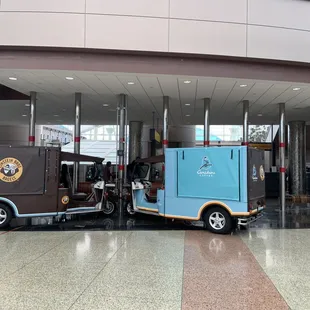 an ice cream truck parked in front of a building