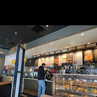 a man standing in front of the counter
