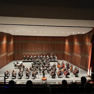 Enjoying the Richardson Symphony Orchestra from the mezzanine level. Great seats!