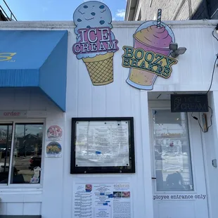 a storefront with ice cream and cookies