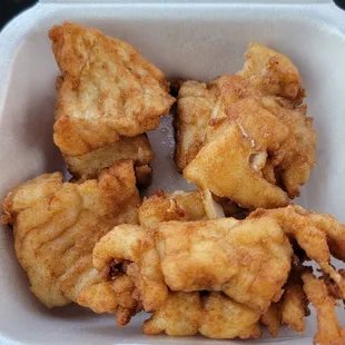 Extra piece(s) of fish. Not worth the $9 I was charged.