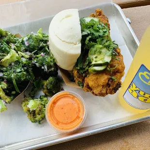 Neighborhood Bird Bun (sauce on side), tempura broccoli, and Yuzuade. Voted best sandwich in MD by Yelp in 2022 -- I know why!