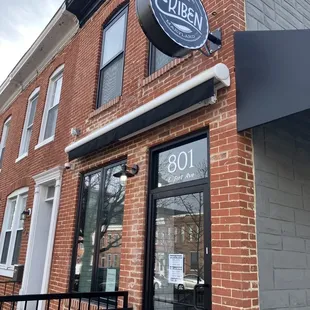 the front of a brick building