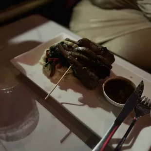 Lamb with garlic mash potatoes and sautéed spinach