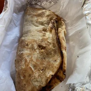 a burrito wrapped in foil