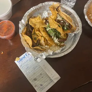 And yes that's how they had my tacos in the container one completely shredded up and all the corn tortillas soggy just falling apart