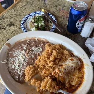 Enchilada, taco beans, and rice
