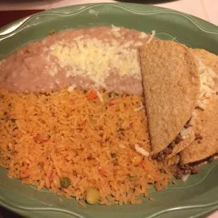 Two tacos, rice and beans. Perfect to share for a light lunch.